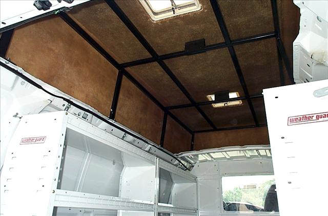 Original cargo van interior with metal shelving