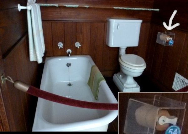 The roll of toilet paper that was in service when FDR died in 1945 (right and inset).  A plastic cover was placed over it to stop visitors from taking a sheet as a souvenir.  The bathroom was mounted away from the wall so FDR could grasp the tub with both hands and swing himself into the tub.  The toilet was raised to be wheelchair accessible.  The lavatory (not shown) was also lowered.
